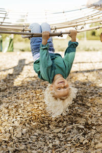 Happy child on climbing frame