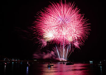 Firework display at night