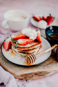 Close-up of cake served on table