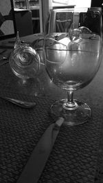 Close-up of wine glass on restaurant table