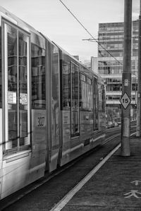 Train on railroad station platform in city