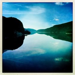 Reflection of sky and clouds in water