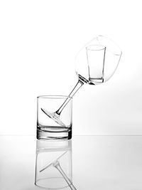 Glass of water against white background