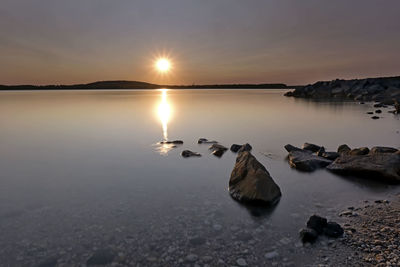 Scenic view of sea against sky during sunset