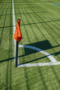 High angle view of umbrella on grassland