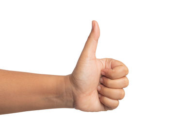 Close-up of human hand against white background