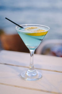 Close-up of blue curacao drink on table