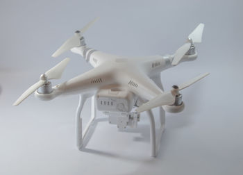 Close-up of drone over gray background