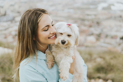 Portrait of woman with dog