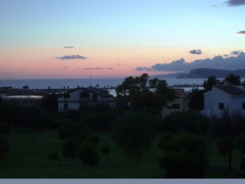 View of buildings at sunset