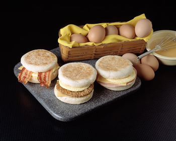 High angle view of cupcakes on table against black background