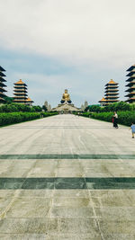 View of historical building against cloudy sky