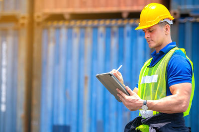 Side view of a man working