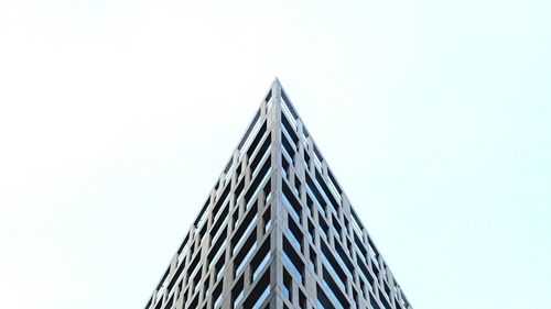 Low angle view of modern building against clear sky