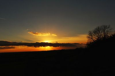 Scenic view of silhouette landscape against sky during sunset