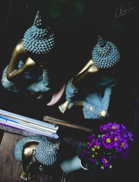 High angle view of woman working in temple