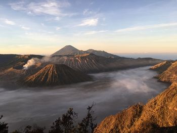 View of volcanic landscape against sky