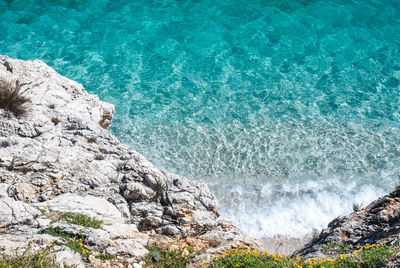 High angle view of rocky beach