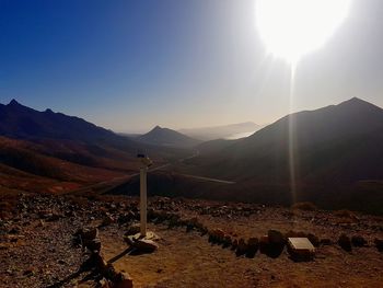 Scenic view of mountains against clear sky during sunset