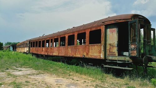 Abandoned train against sky
