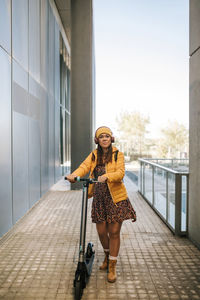 Full length of woman standing outdoors