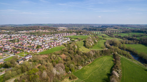 High angle view of trees on field against sky