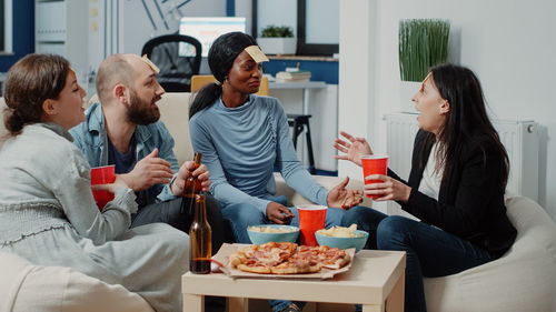 Female friends working at home