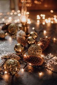 Close-up of illuminated christmas lights on table