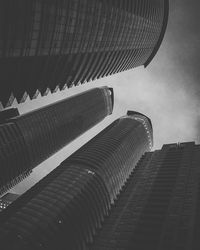 Low angle view of modern buildings against sky