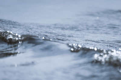 Close-up of water splashing in sea