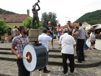 Group of people on street in city