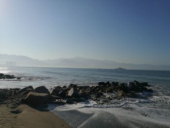 Scenic view of sea against clear sky