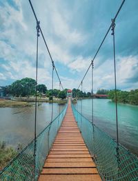 A hanging bridge which is located in sungai rambai, melaka, malaysia.