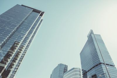 Low angle view of skyscraper against clear sky