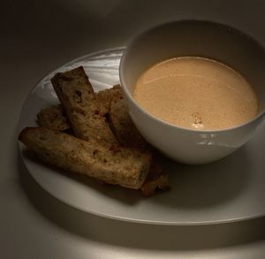 High angle view of coffee in plate on table