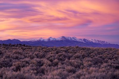 Scenic view of mountains against sky during sunset