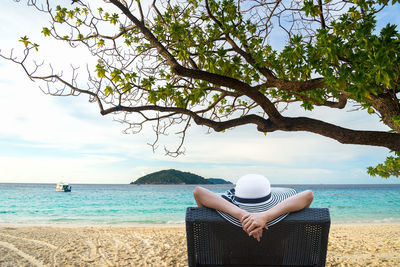 Man looking at sea against sky