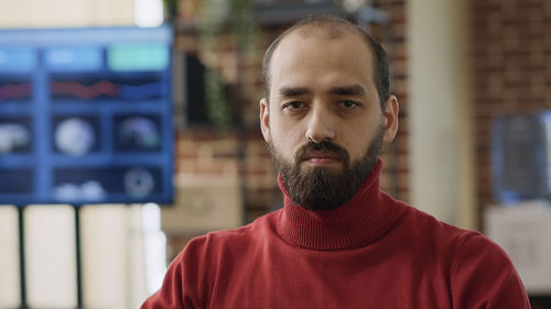 Portrait of young businessman in office