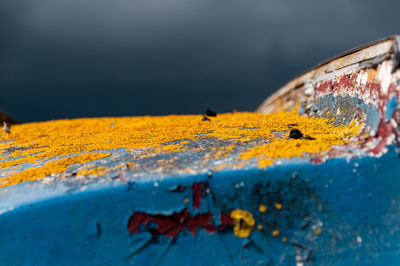 Close-up of rusty metal chain on boat