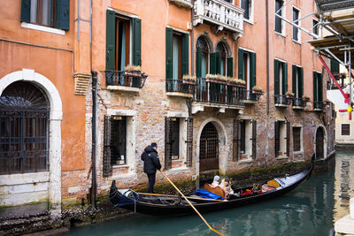 View of people on boat in canal