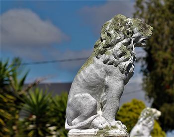 Close-up of statue against sky