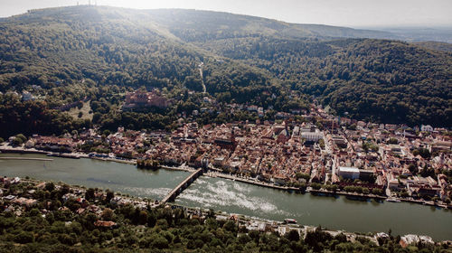 High angle view of river amidst buildings in town