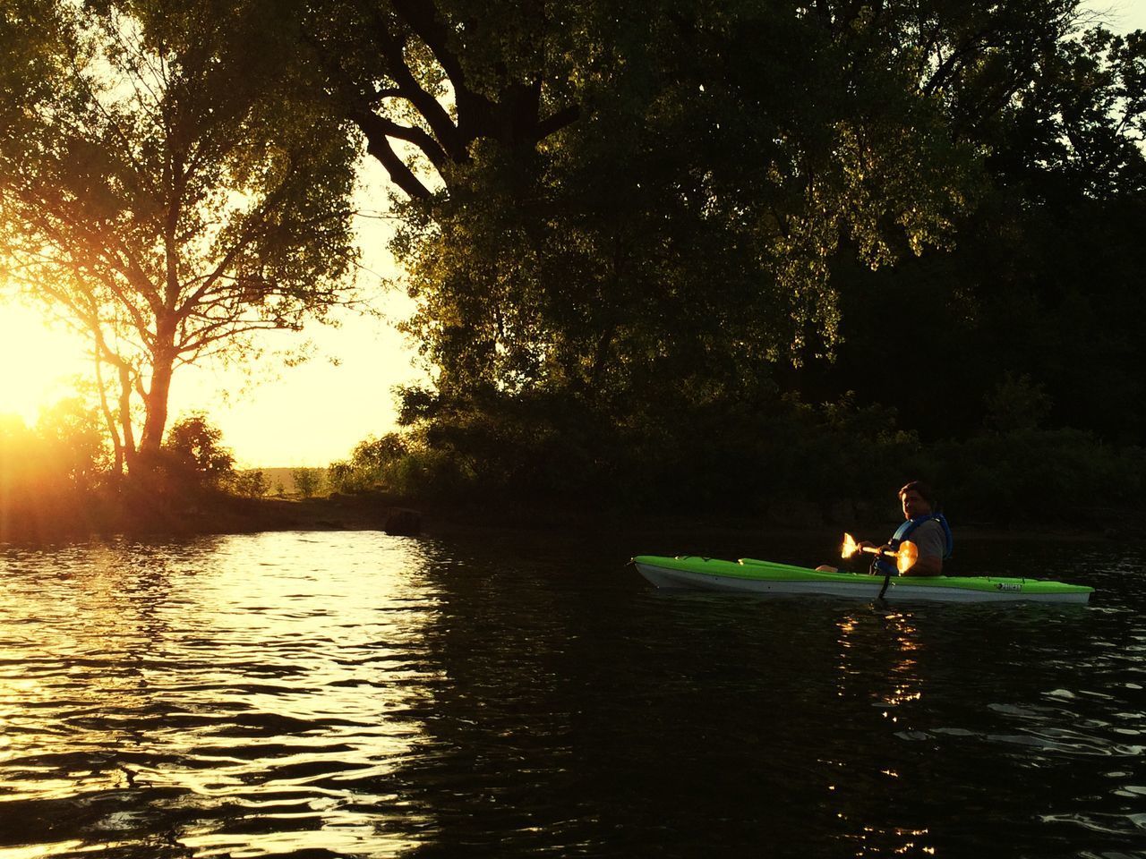 MAN SURFING ON LAKE AGAINST SKY