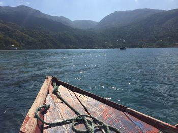 Scenic view of sea against mountains