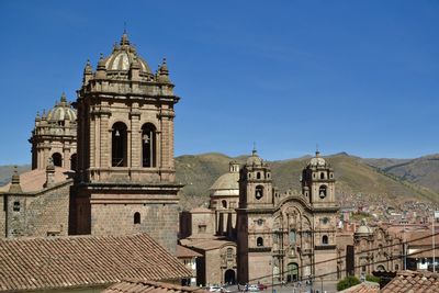 View of bell tower against blue sky