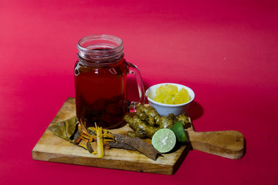 Close-up of drink in glass jar on table