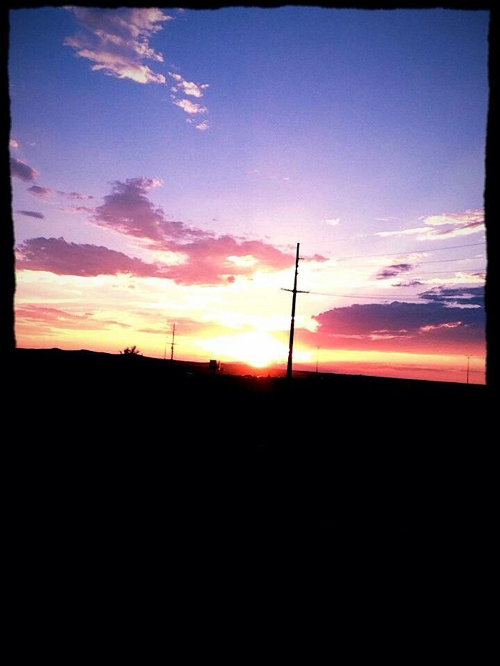 sunset, silhouette, sky, scenics, tranquil scene, tranquility, beauty in nature, orange color, nature, dark, landscape, cloud - sky, idyllic, sun, cloud, outline, dramatic sky, outdoors, no people, sunlight