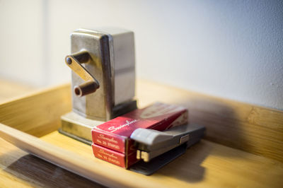 Close-up of piano on table