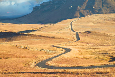 High angle view of road leading towards mountain