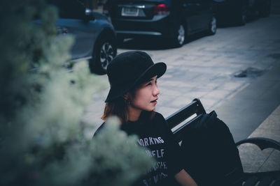 Man looking away in car